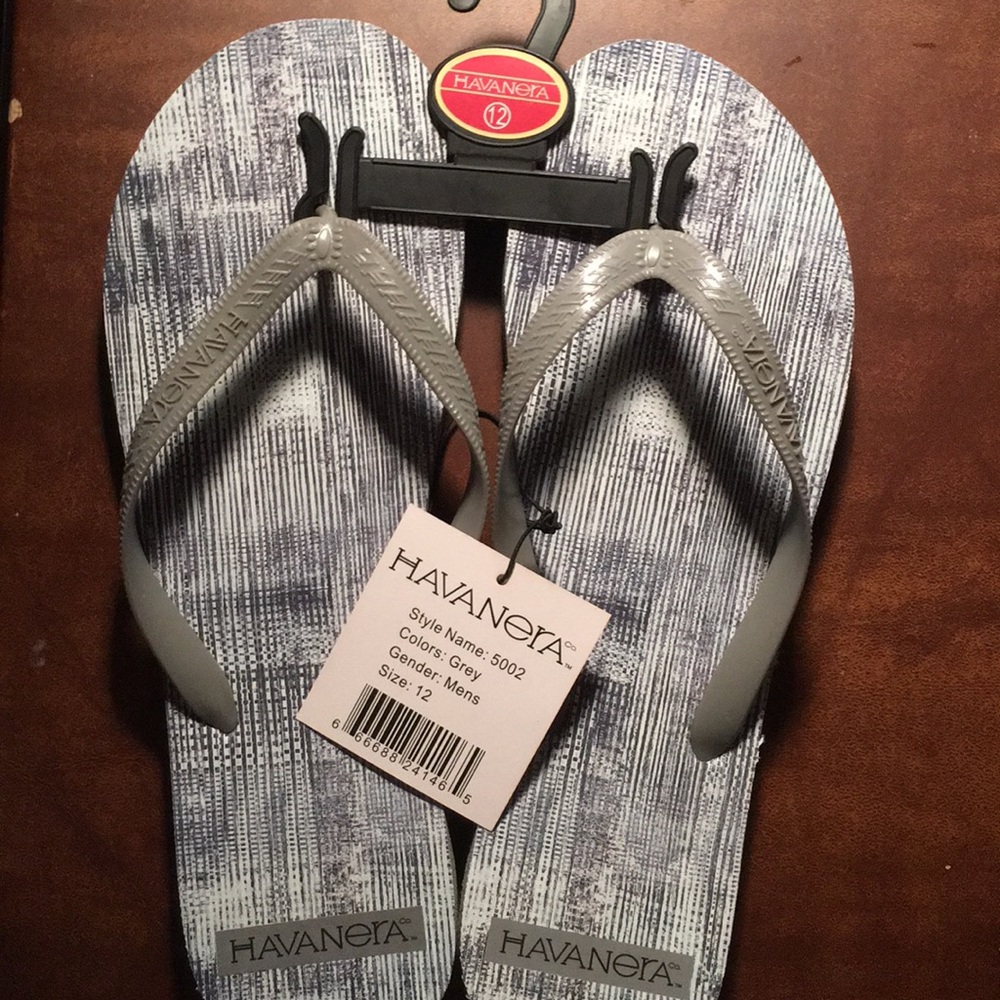 Never worn gray flip flops